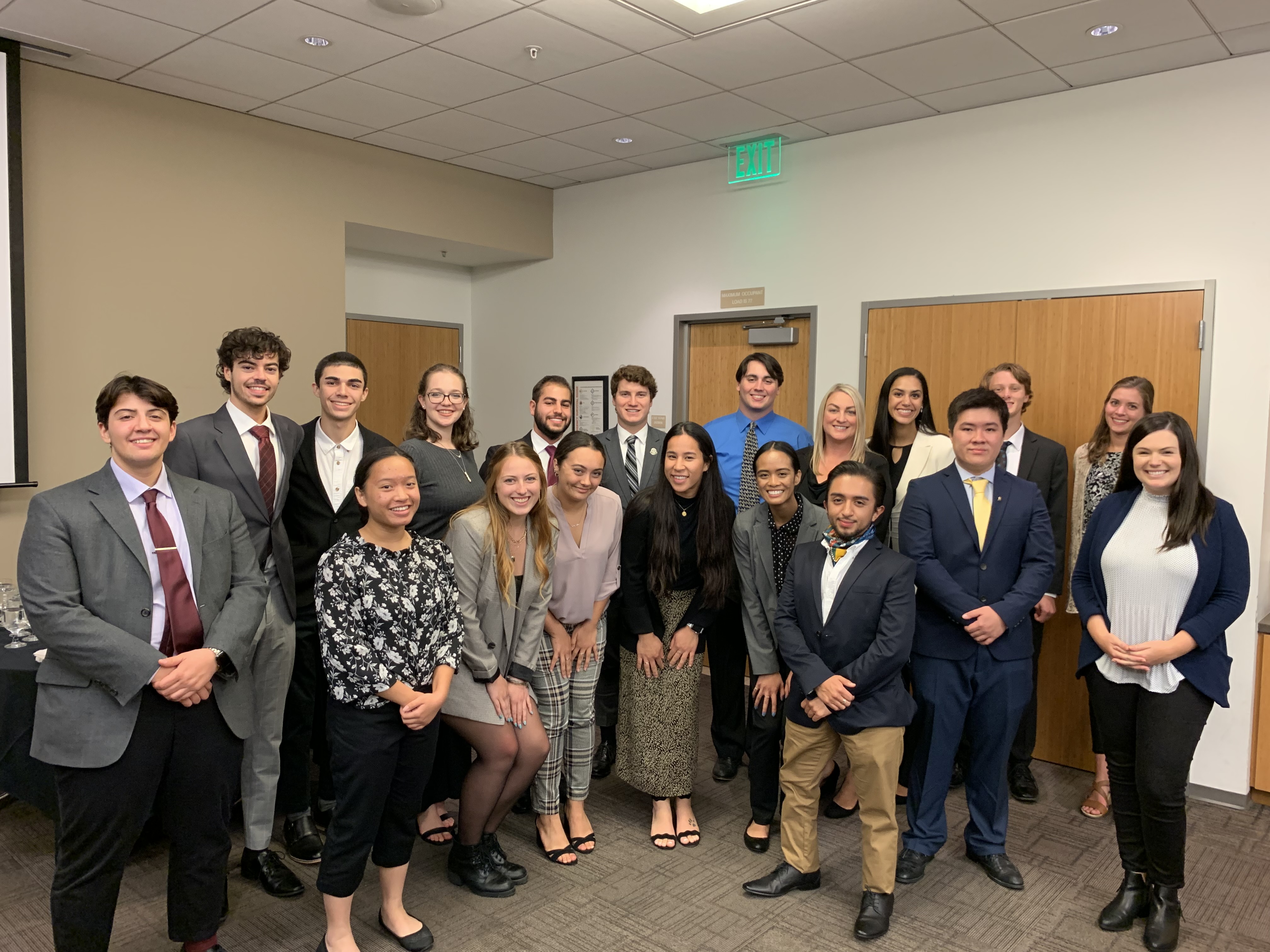 Delta Sigma Pi at the etiquette dinner with Mariah Lucas